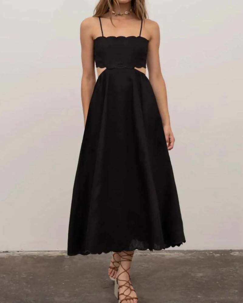 Front of a model wearing a size L Mindy Scalloped Mini Dress in Black in Black by MOON RIVER. | dia_product_style_image_id:335370